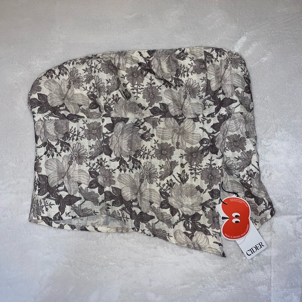 Brand new, never worn, tag on, floral print green strapless top with slit